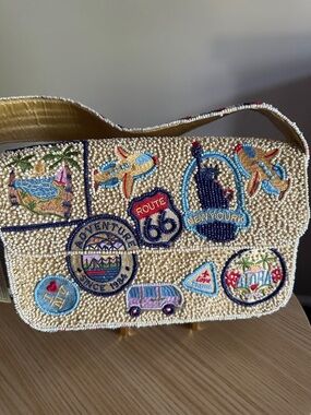 Embroidered Cream Beaded Crossbody with Travel Patch Motifs